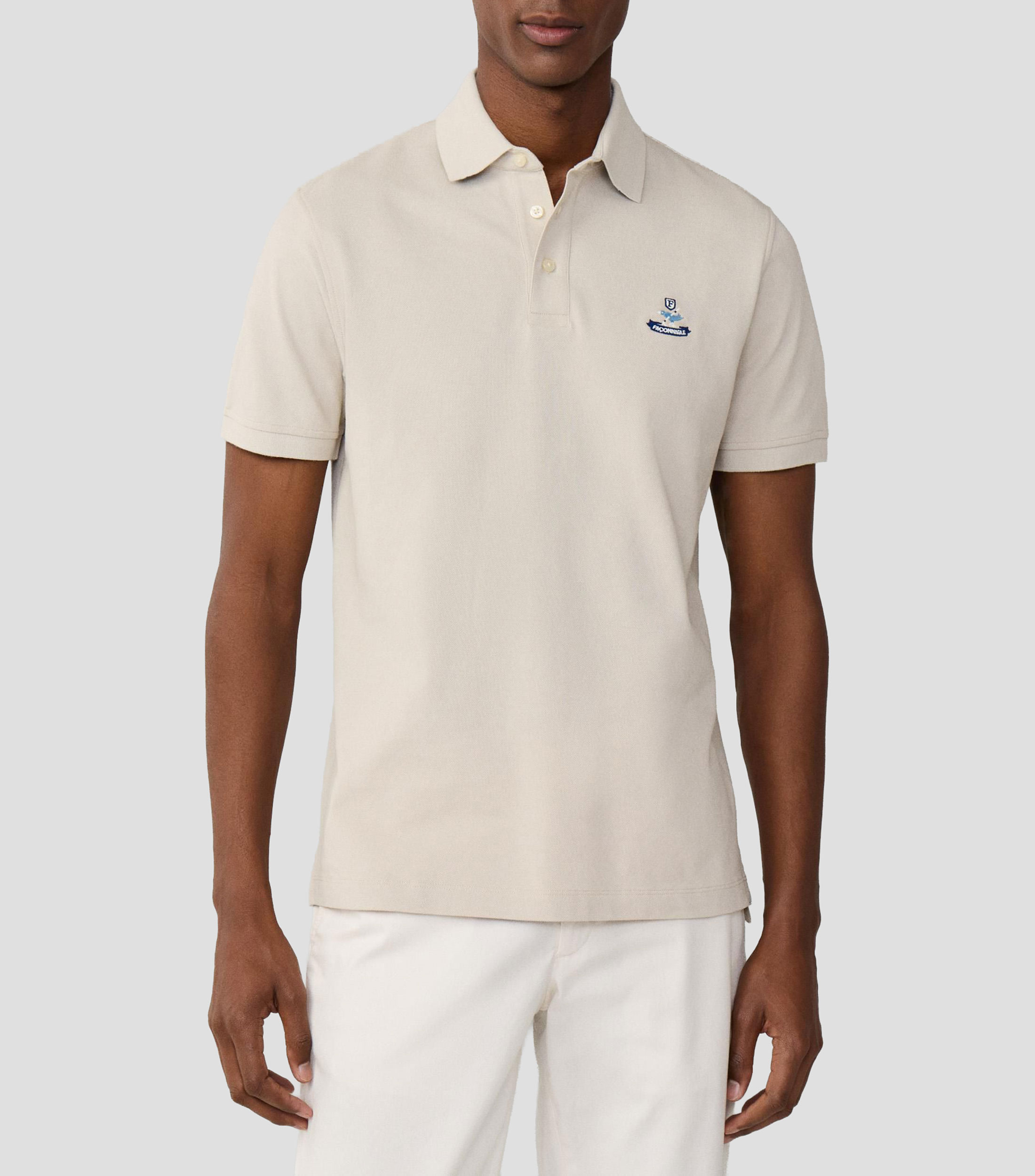 Playera tipo polo con manga corta lisa Hombre
